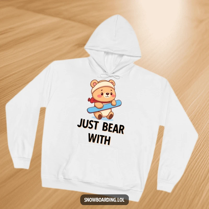 Funny cute bear balancing a snowboard on its nose, featured on a hoodie.