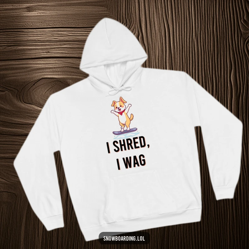 Funny hoodie featuring a happy dancing dog impeccably balanced on a snowboard, tail wagging, perfect for winter fun and as a hilarious gift.