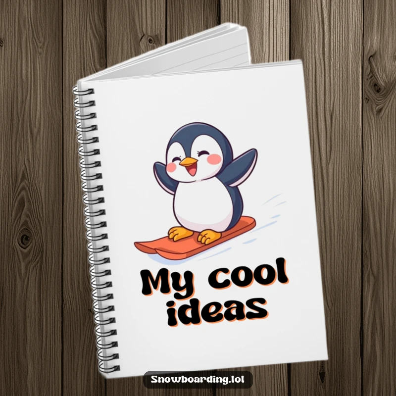 Funny joyful penguin carving down a snowy slope on a snowboard on a notebook cover.
