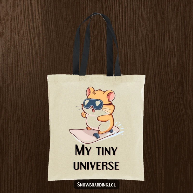 Funny Hamster Tote Bag, featuring a curious character attempting to steer a snowboard, perfect for carrying essentials with humor.